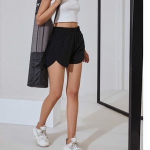 NWT BMJL black, athletic running shorts high waisted quick dry size L.